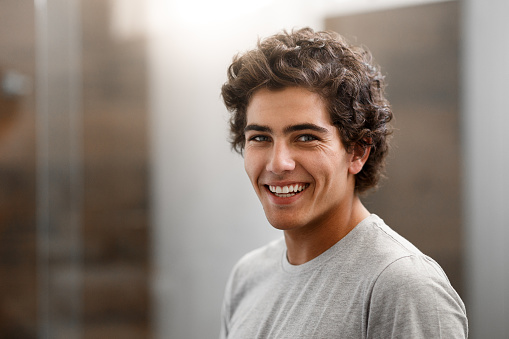 Smiling man after scaling and root planing procedure from Long Island Smile in Williston Park, NY